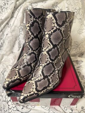 Circus by Sam Edelman Snake-Print Pointed Toe Ankle Boots in Gray. 3-inch heel